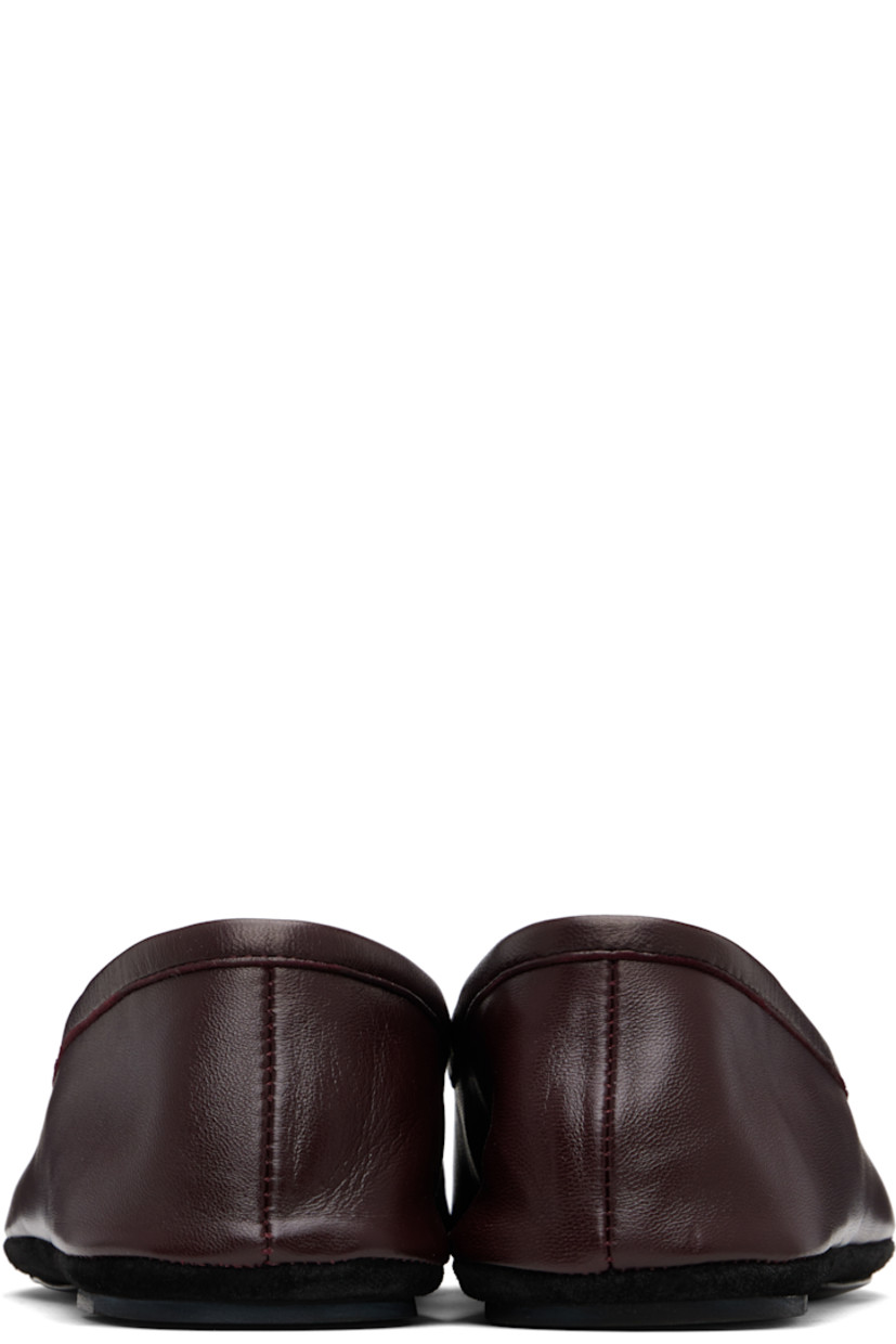 Grained nappa lambskin loafers.

· LWG Gold-certified leather
· Square toe
· Collapsible heel counter
· Leather lining
· Suede midsole
· Leather island sole with rubber heel

Supplier color: Dark Eggplant