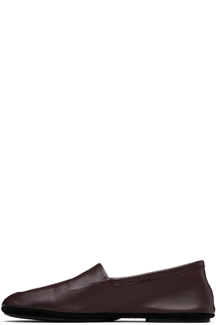 Grained nappa lambskin loafers.

· LWG Gold-certified leather
· Square toe
· Collapsible heel counter
· Leather lining
· Suede midsole
· Leather island sole with rubber heel

Supplier color: Dark Eggplant