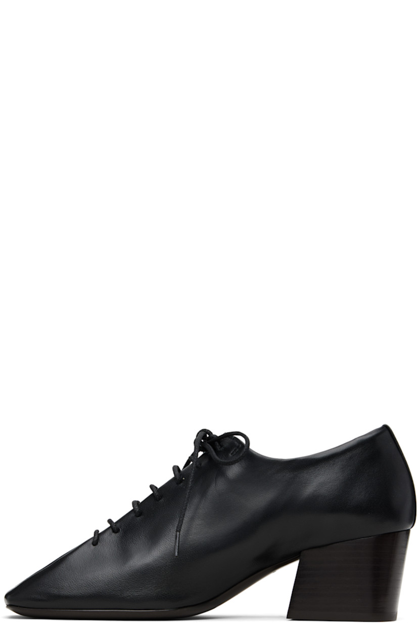 Lightweight grained lambskin heels.

· Single-piece upper
· Square toe
· Lace-up closure
· Leather lining
· Stacked leather heel
· Leather sole with rubber heel
· Heel: H2"

Supplier color: Black
