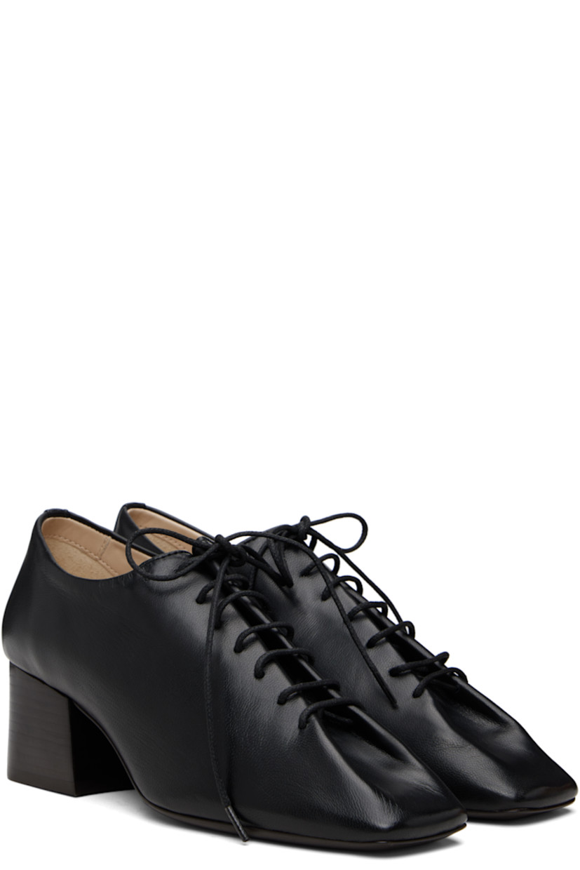 Lightweight grained lambskin heels.

· Single-piece upper
· Square toe
· Lace-up closure
· Leather lining
· Stacked leather heel
· Leather sole with rubber heel
· Heel: H2"

Supplier color: Black