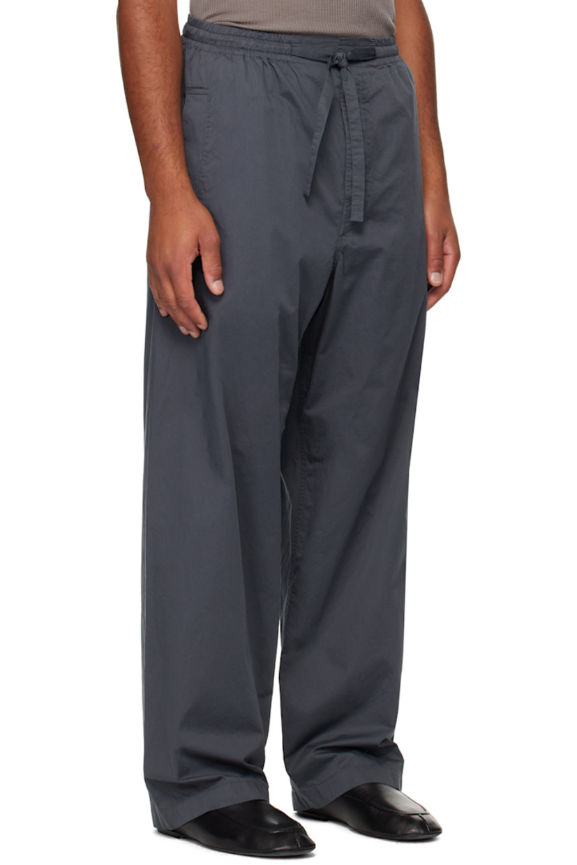 Cotton poplin trousers.

· Drawstring at elasticized waistband
· Three-pocket styling
· Button fly 

Supplier color: Carbon grey