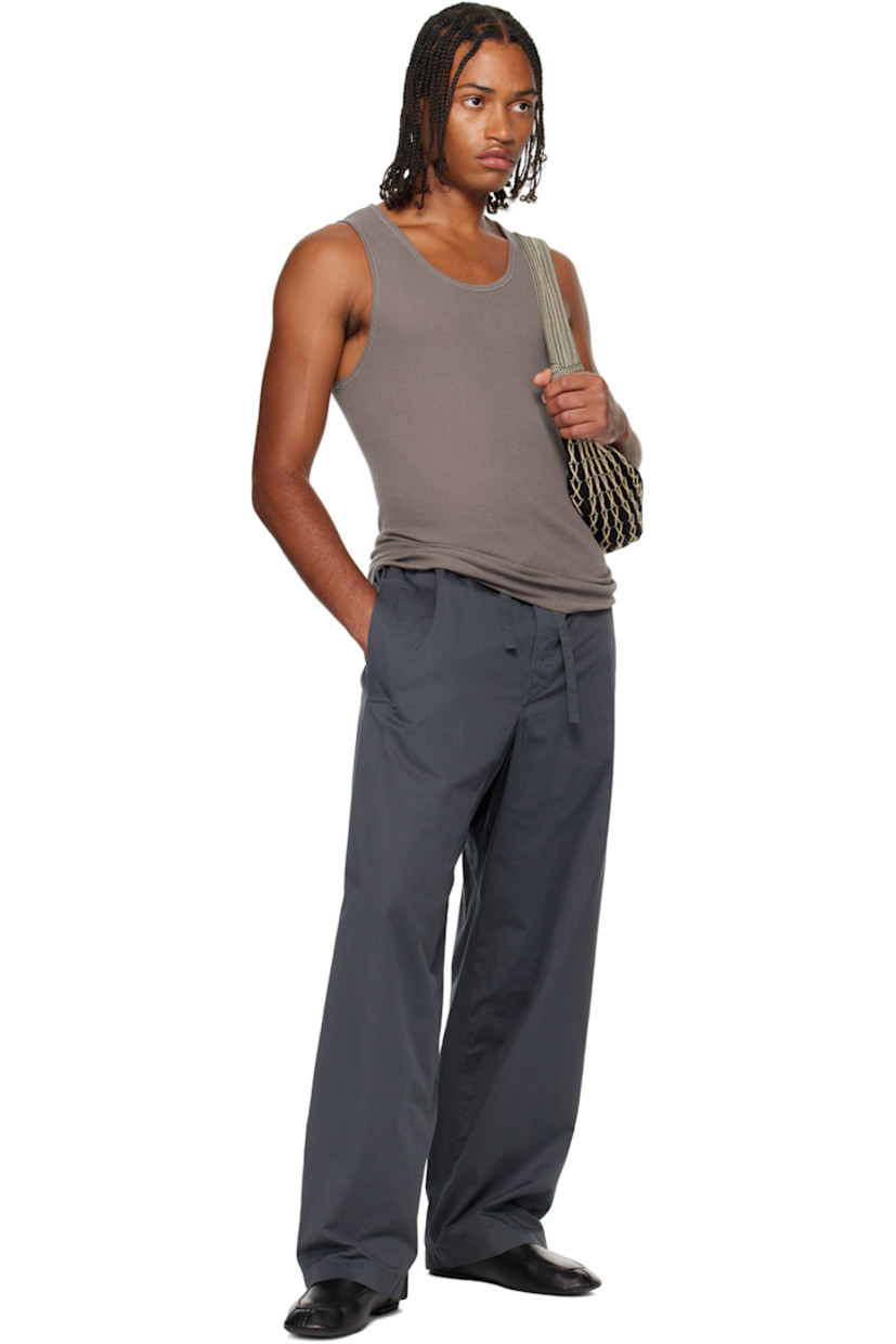 Cotton poplin trousers.

· Drawstring at elasticized waistband
· Three-pocket styling
· Button fly 

Supplier color: Carbon grey