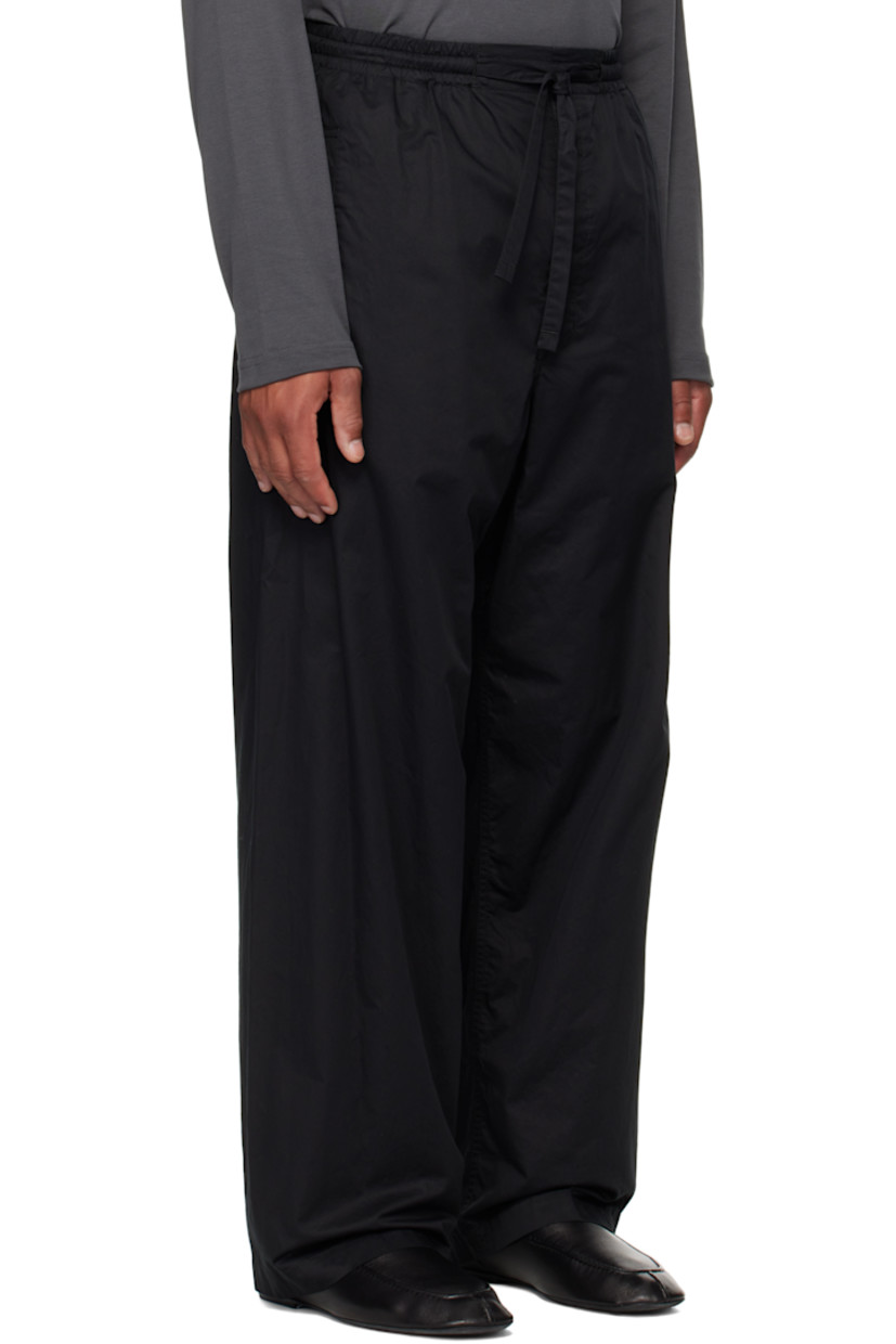 Cotton poplin trousers.

· Drawstring at elasticized waistband
· Three-pocket styling
· Button fly 

Supplier color: Black
