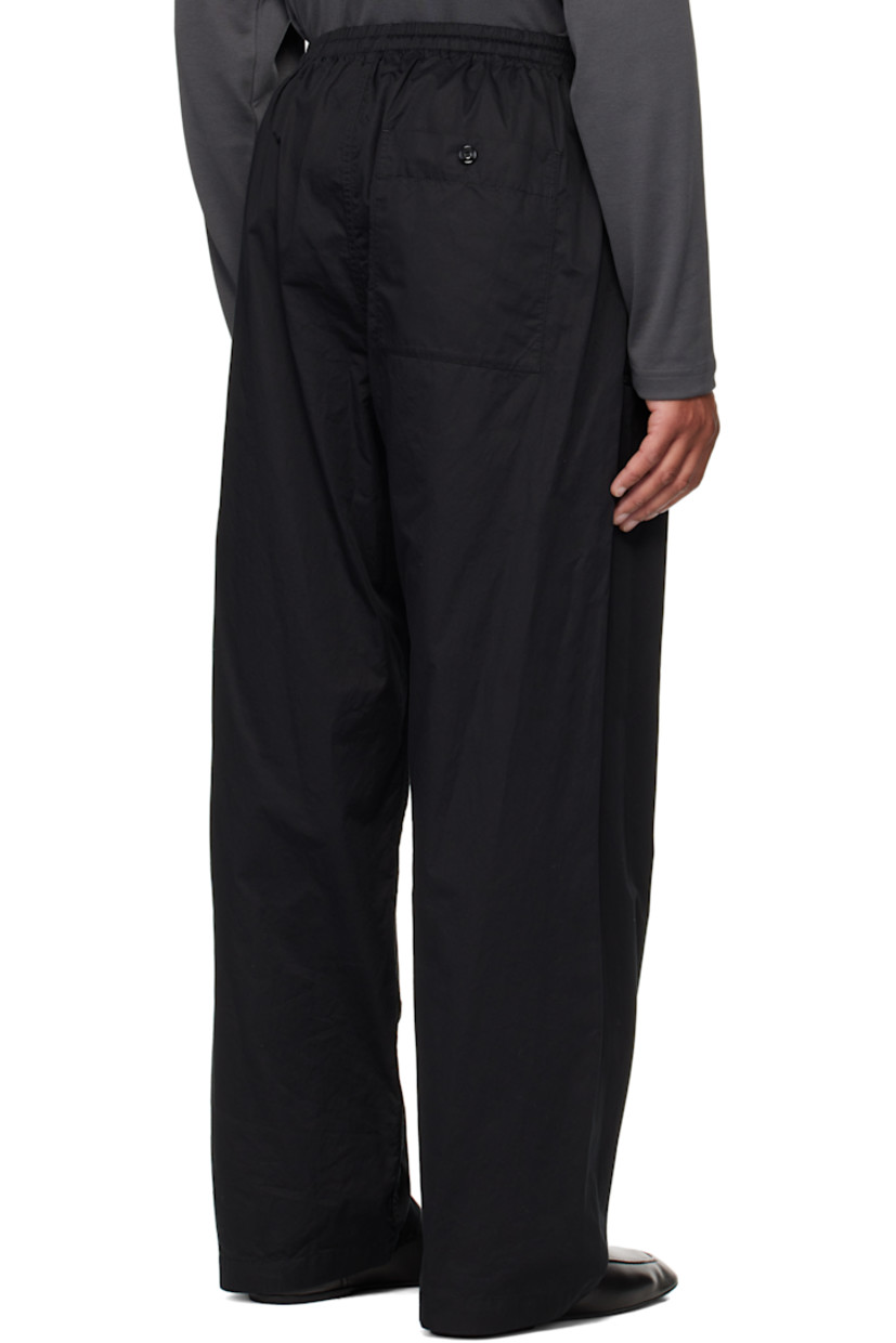 Cotton poplin trousers.

· Drawstring at elasticized waistband
· Three-pocket styling
· Button fly 

Supplier color: Black