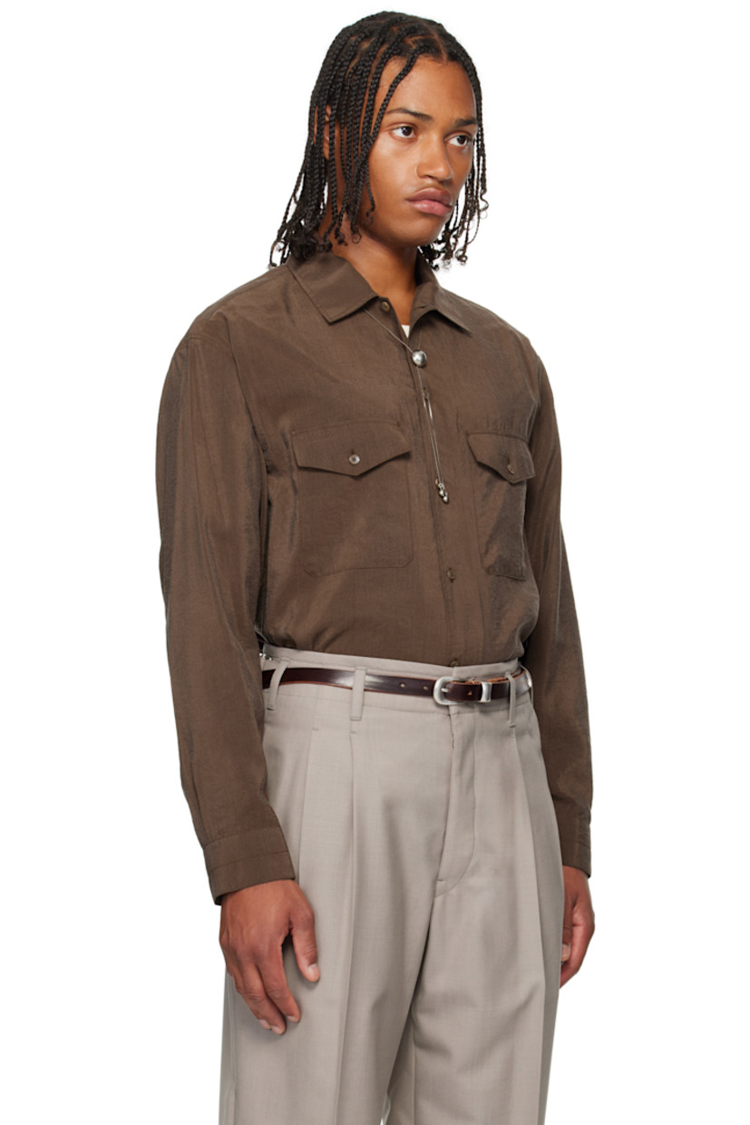Crinkled silk-blend sateen shirt. 

· Buttoned open spread collar 
· Button closure
· Flap pockets at front 
· Vented side seams
· Pleats at buttoned barrel cuffs
· Box pleat at back yoke 

Supplier color: Brunette