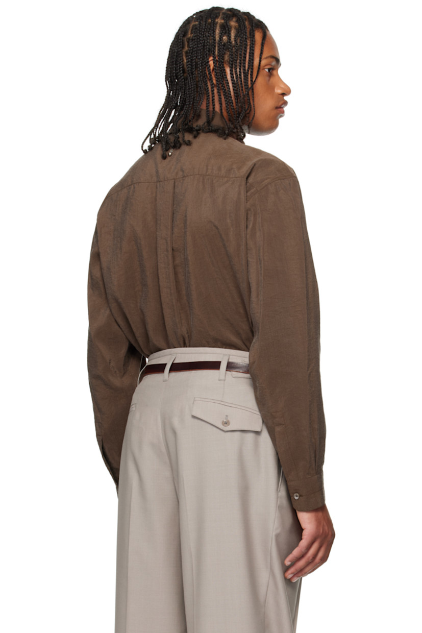 Crinkled silk-blend sateen shirt. 

· Buttoned open spread collar 
· Button closure
· Flap pockets at front 
· Vented side seams
· Pleats at buttoned barrel cuffs
· Box pleat at back yoke 

Supplier color: Brunette