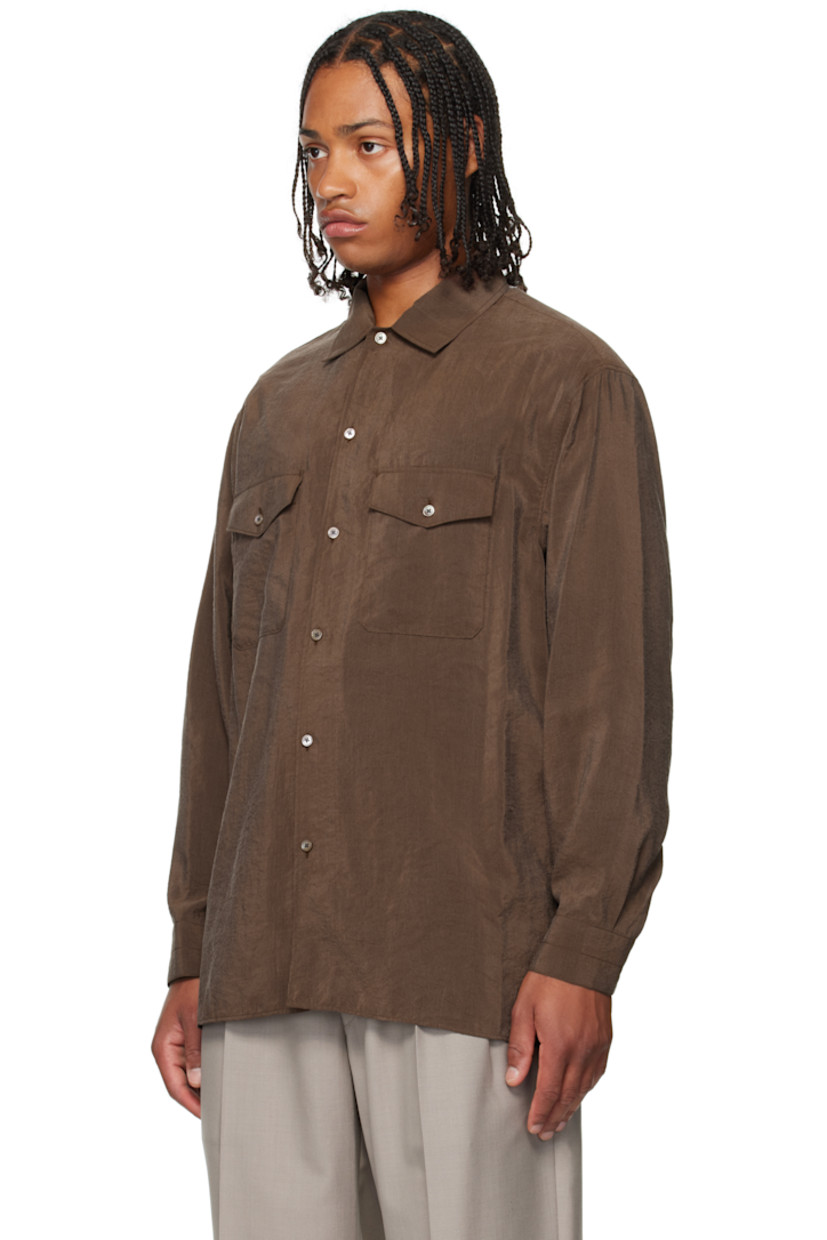 Crinkled silk-blend sateen shirt. 

· Buttoned open spread collar 
· Button closure
· Flap pockets at front 
· Vented side seams
· Pleats at buttoned barrel cuffs
· Box pleat at back yoke 

Supplier color: Brunette