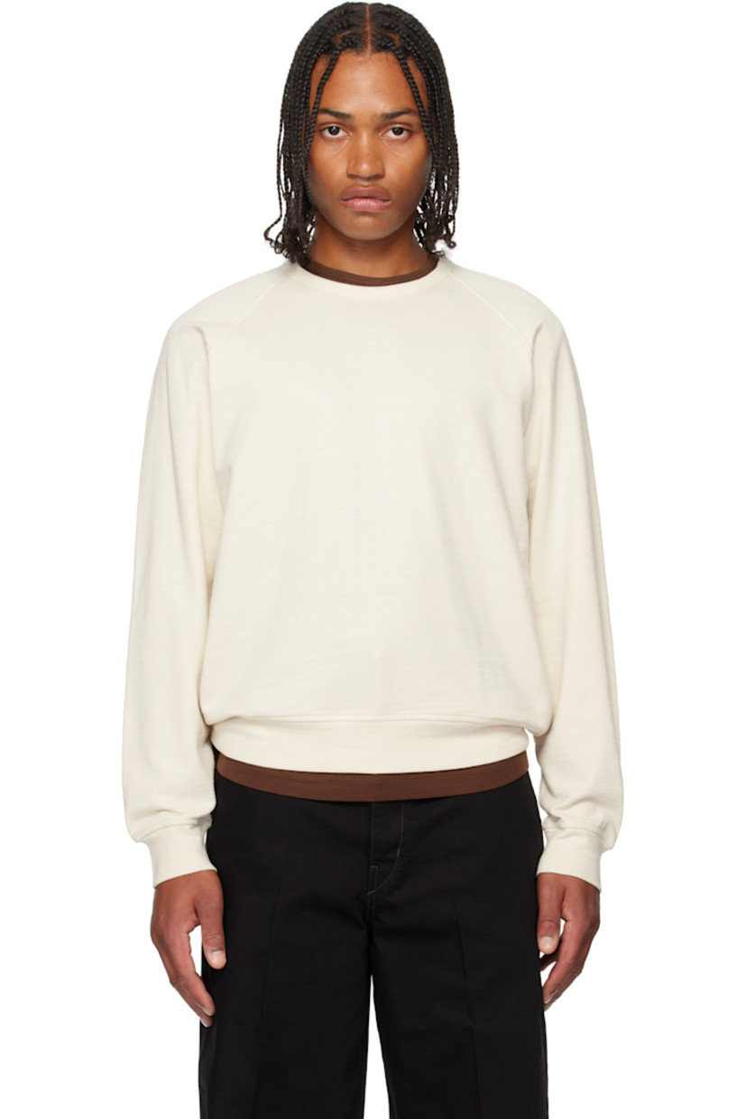 Cotton-blend French terry sweatshirt. 

· Rib-knit crewneck, hem, and cuffs
· Raglan sleeves

Supplier color: Light cream