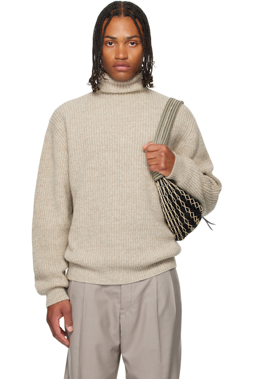 Rib-knit alpaca-blend sweater. 

· Turtleneck
· Dropped shoulders

Supplier color: Beige/Oat