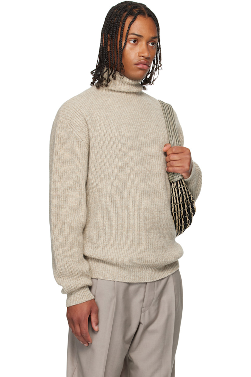 Rib-knit alpaca-blend sweater. 

· Turtleneck
· Dropped shoulders

Supplier color: Beige/Oat