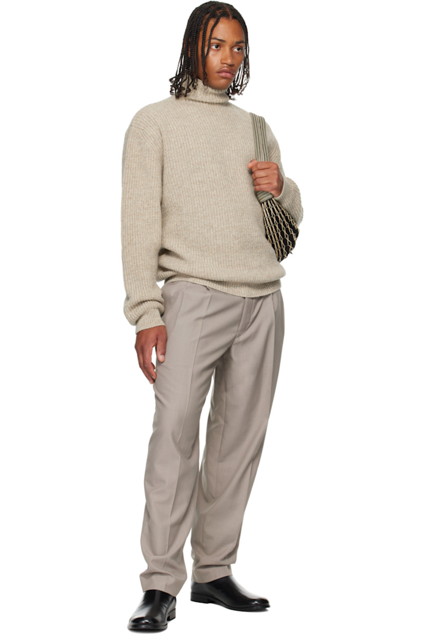 Rib-knit alpaca-blend sweater. 

· Turtleneck
· Dropped shoulders

Supplier color: Beige/Oat