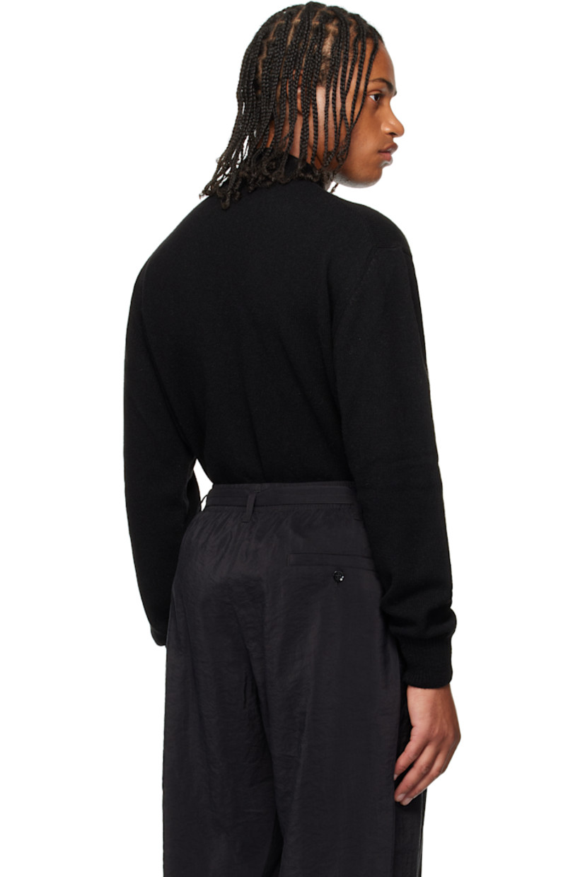 Knit alpaca-blend sweater. 

· Rib-knit mock neck, hem, and cuffs
· Dropped shoulders

Supplier color: Black