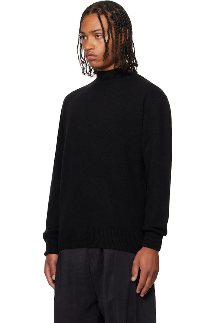 Knit alpaca-blend sweater. 

· Rib-knit mock neck, hem, and cuffs
· Dropped shoulders

Supplier color: Black