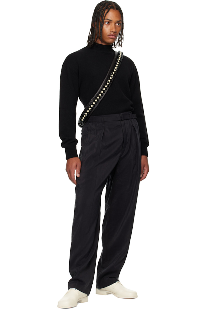 Knit alpaca-blend sweater. 

· Rib-knit mock neck, hem, and cuffs
· Dropped shoulders

Supplier color: Black