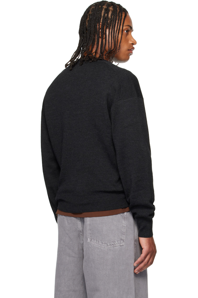 Knit wool-blend sweater. 

· Rib-knit V-neck, hem, and cuffs
· Central seam at front 
· Dropped shoulders

Supplier color: Anthracite