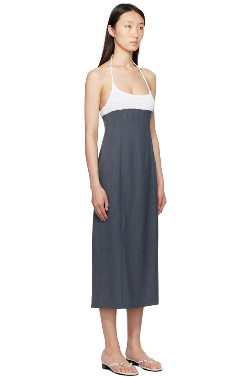 Recycled polyester- and merino wool-blend twill midi dress.

· Scoop neck
· Knit organic cotton panel at chest
· Concealed zip closure at side
· Self-tie halter strap
· Vent at back hem
· Mulesing-free wool

Supplier color: Grey