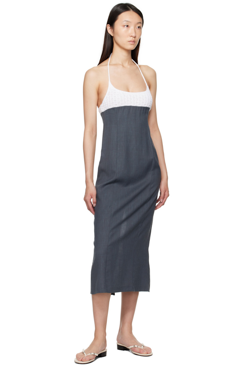 Recycled polyester- and merino wool-blend twill midi dress.

· Scoop neck
· Knit organic cotton panel at chest
· Concealed zip closure at side
· Self-tie halter strap
· Vent at back hem
· Mulesing-free wool

Supplier color: Grey