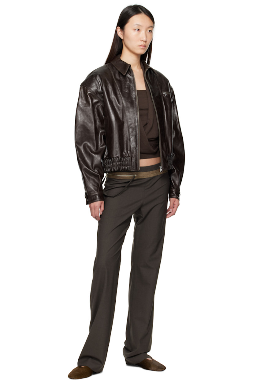 Crinkled lambskin jacket.

· Spread collar
· Zip closure
· Zip pocket at chest
· Welt pockets
· Cropped elasticized hem
· Padded shoulders
· Zip vent at press-stud cuffs
· Full satin lining

Supplier color: Brown
