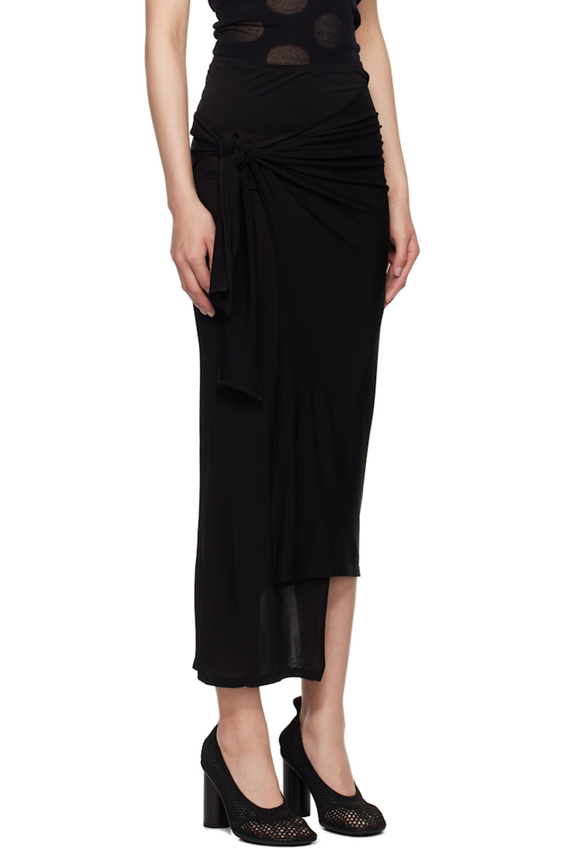Semi-sheer stretch viscose maxi skirt.

· FSC-certified viscose
· Wrap construction
· Self-tie fastening

Supplier color: Black