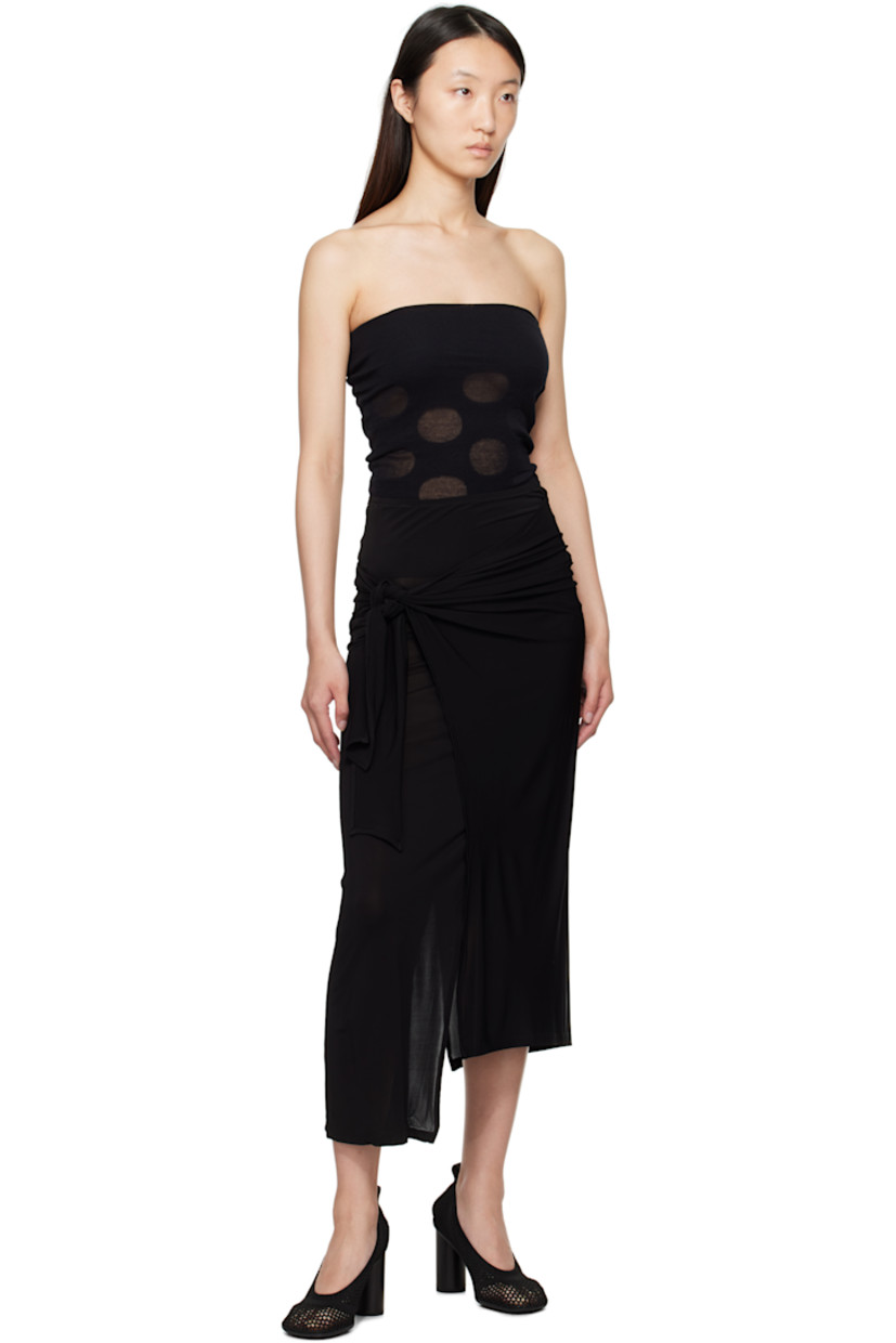 Semi-sheer stretch viscose maxi skirt.

· FSC-certified viscose
· Wrap construction
· Self-tie fastening

Supplier color: Black