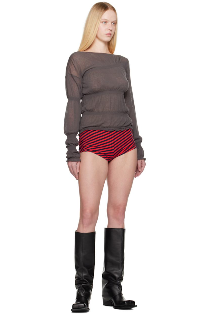 Lightweight knit organic cotton-blend sweater. Rib-knit trim and ruching throughout.

· Asymmetrical construction
· Boatneck
· Lettuce edge at hem and cuffs

Supplier color: Dark grey