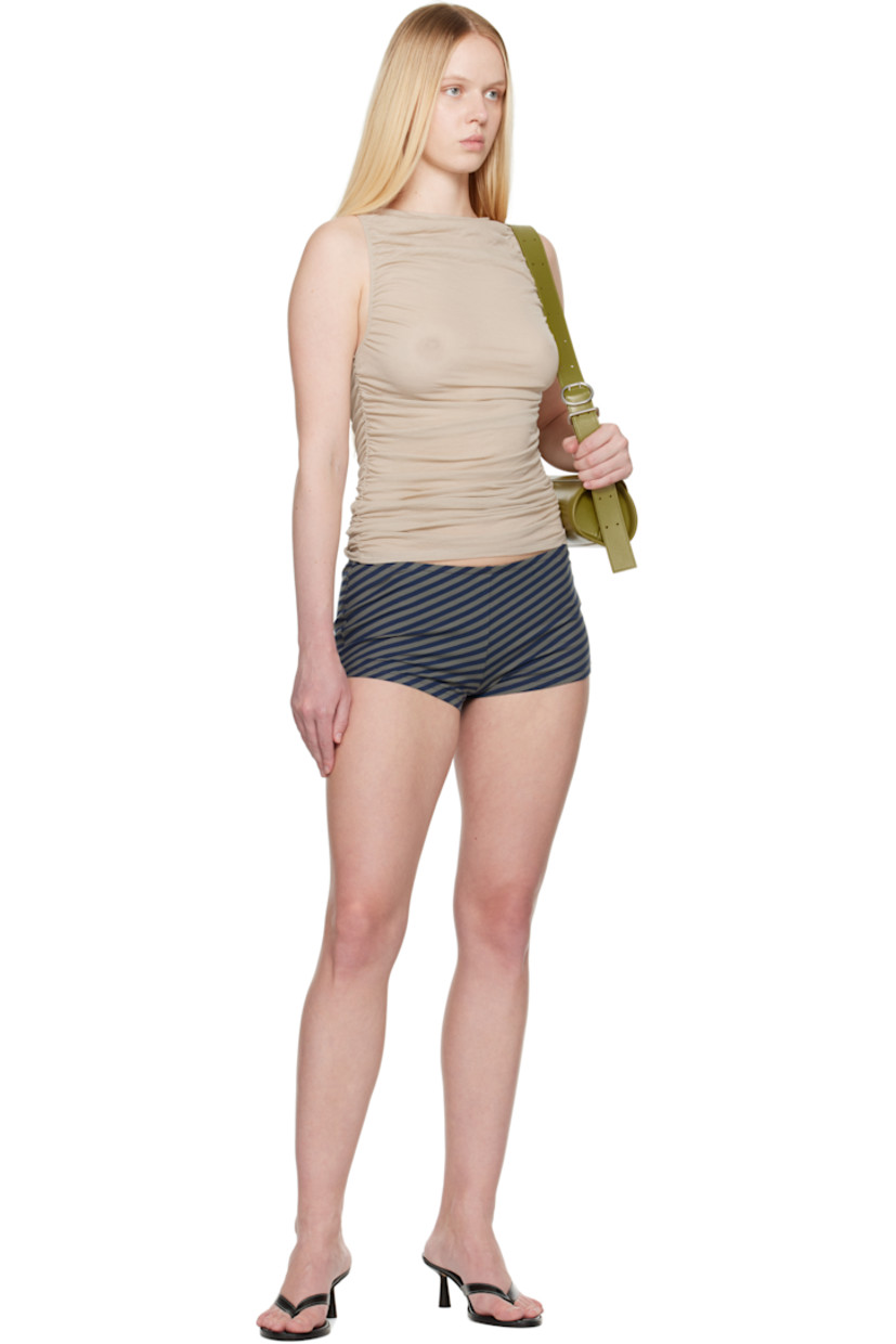 Semi-sheer organic cotton-blend jersey tank top.

· Draped construction
· Crewneck
· Ruching at side seams

Supplier color: Beige