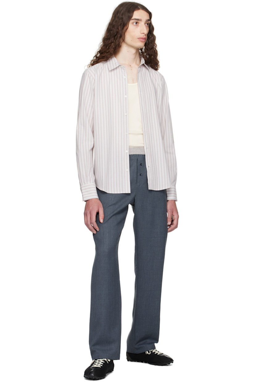 Organic cotton-blend poplin shirt. 

· Stripes throughout 
· Spread collar
· Button closure
· Logo embroidered at front 
· Shirttail hem 

Supplier color: Grey