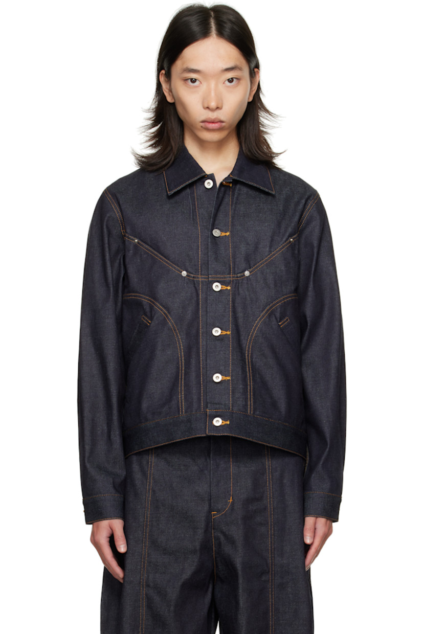 Non-stretch denim jacket.

· Fading throughout
· Spread collar
· Button closure
· Welt pockets at front
· Cropped hem
· Buttoned barrel cuffs
· Adjustable button tabs and logo patch at back hem
· Contrast stitching in tan

Supplier color: Raw denim
