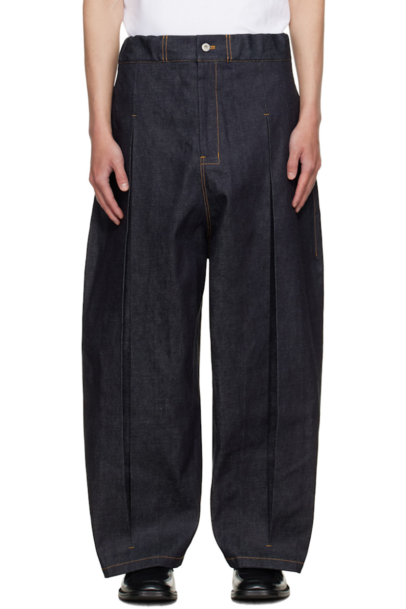 Non-stretch denim jeans.

· Elasticized waistband
· Four-pocket styling
· Zip fly
· Inverted box pleat at front legs
· Contrast stitching in tan

Supplier color: Raw denim