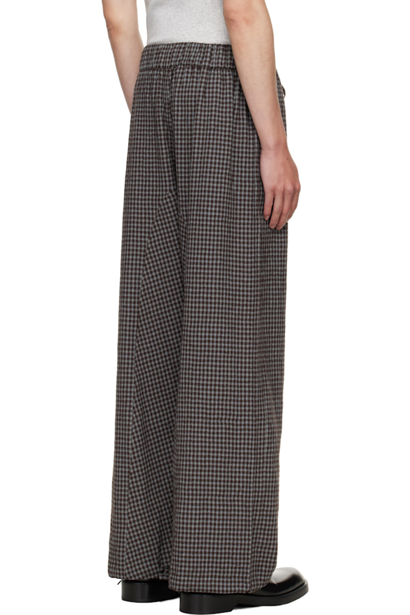 Cotton- and wool-blend seersucker trousers.

· Check pattern throughout
· Drawstring at elasticized waistband
· Two-pocket styling
· Drawstring at cuffs

Supplier color: Mint gingham check