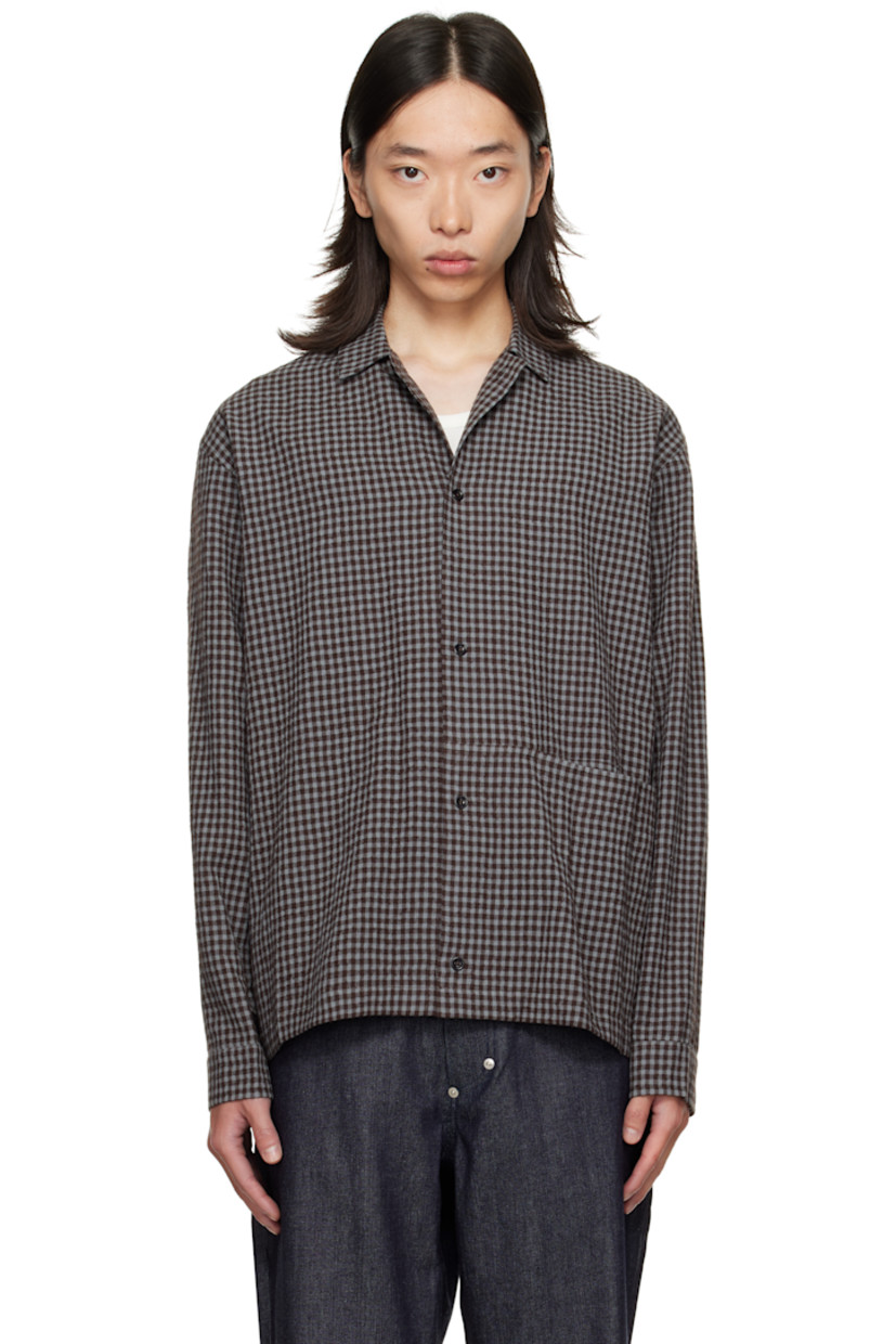 Cotton- and wool-blend seersucker shirt.

· Check pattern throughout
· Spread collar
· Button closure
· Welt pocket at front
· Buttoned barrel cuffs

Supplier color: Mint gingham check