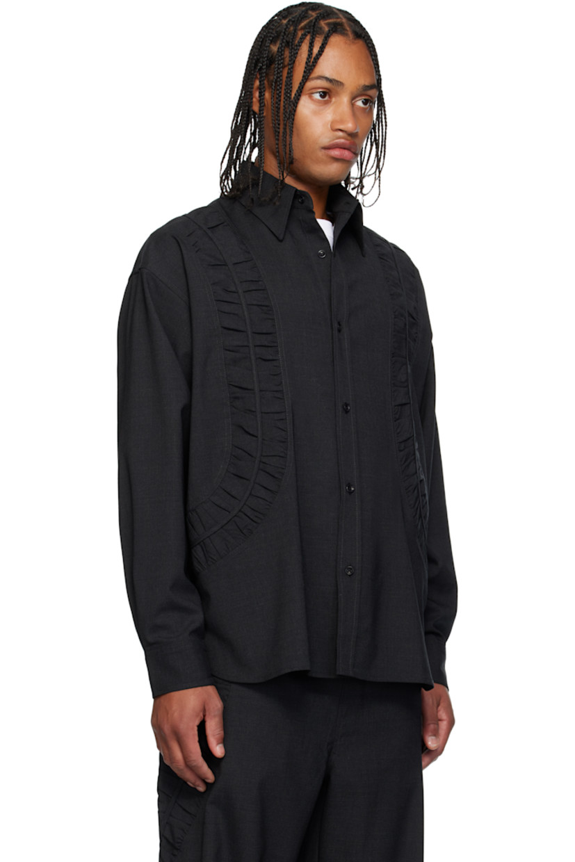 Plain-woven stretch wool-blend shirt.

· Gathering throughout 
· Spread collar 
· Button closure
· Shirttail hem 
· Pleats at buttoned barrel cuffs
· Dropped shoulders
· Box pleat at back yoke 

Supplier color: Charcoal