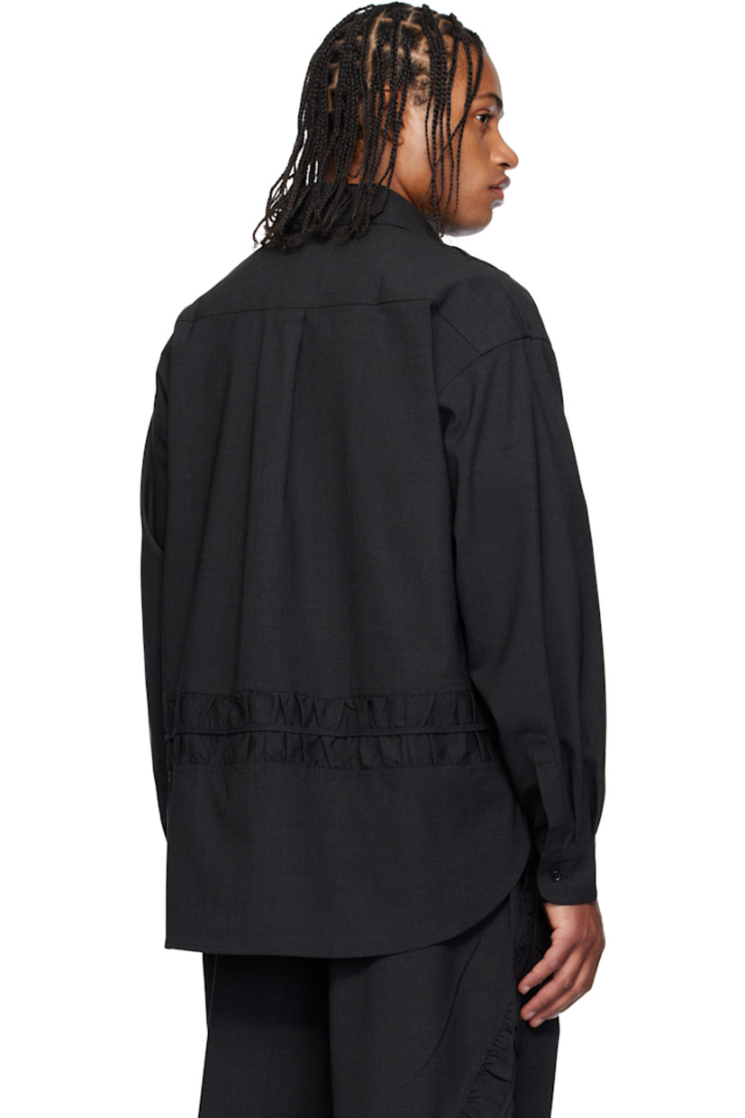 Plain-woven stretch wool-blend shirt.

· Gathering throughout 
· Spread collar 
· Button closure
· Shirttail hem 
· Pleats at buttoned barrel cuffs
· Dropped shoulders
· Box pleat at back yoke 

Supplier color: Charcoal
