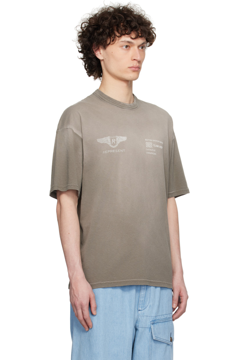 160 gsm slub cotton- and hemp-blend jersey T-shirt. Discoloration throughout.

· Garment-dyed
· Rib-knit crewneck
· Logo graphic and text printed at chest
· Logo plaque at hem
· Dropped shoulders
· Text and logo printed at back

Supplier color: Dark taupe