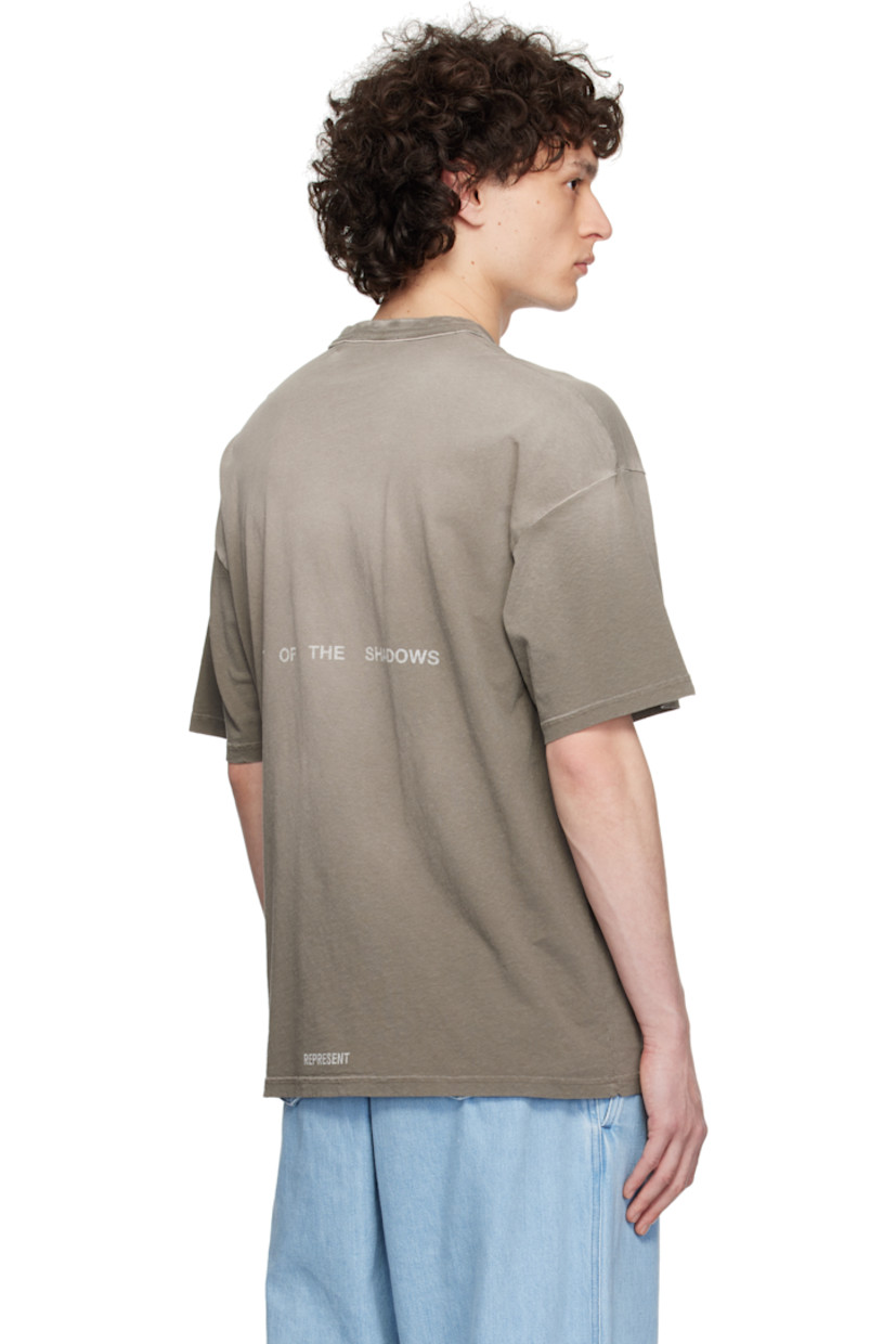 160 gsm slub cotton- and hemp-blend jersey T-shirt. Discoloration throughout.

· Garment-dyed
· Rib-knit crewneck
· Logo graphic and text printed at chest
· Logo plaque at hem
· Dropped shoulders
· Text and logo printed at back

Supplier color: Dark taupe
