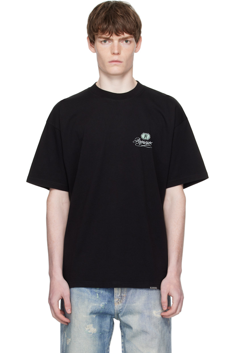 Heavyweight cotton jersey T-shirt. 

· Oversized
· Rib-knit crewneck
· Logo printed at chest
· Dropped shoulders
· Logo hardware at hem
· Vented side seams
· Logo graphic printed at back

Supplier color: Jet black