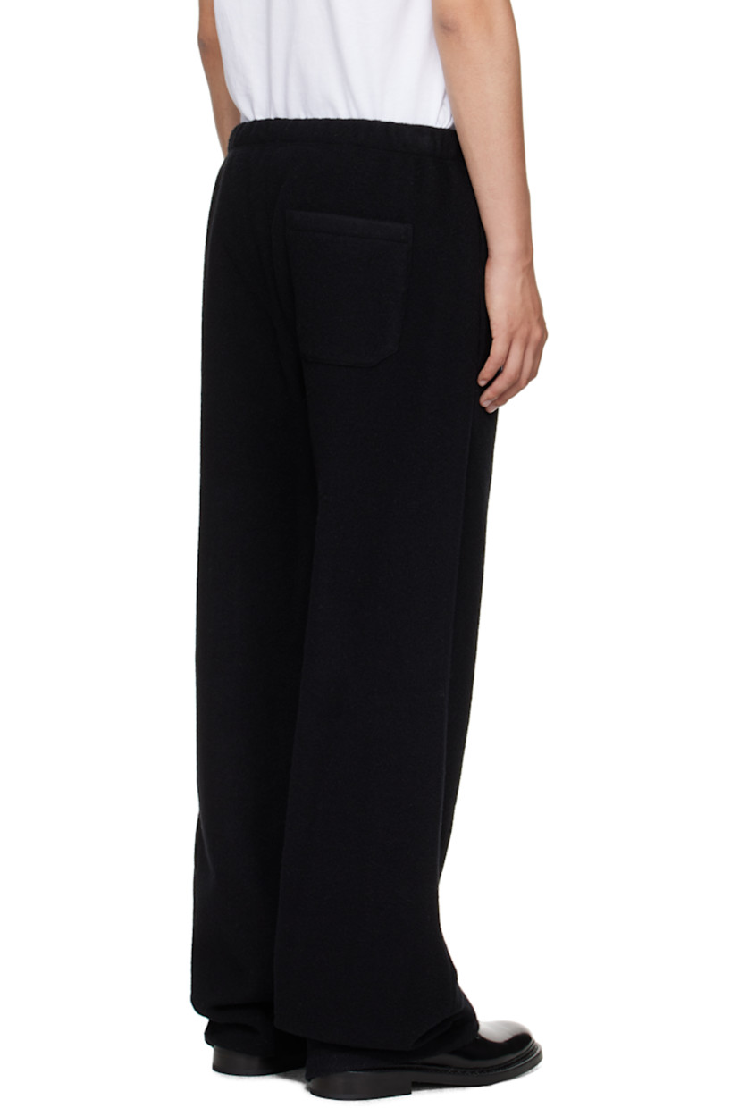 Lightweight brushed virgin wool fleece trousers.

· Concealed drawstring at elasticized waistband
· Three-pocket styling

Supplier color: Black