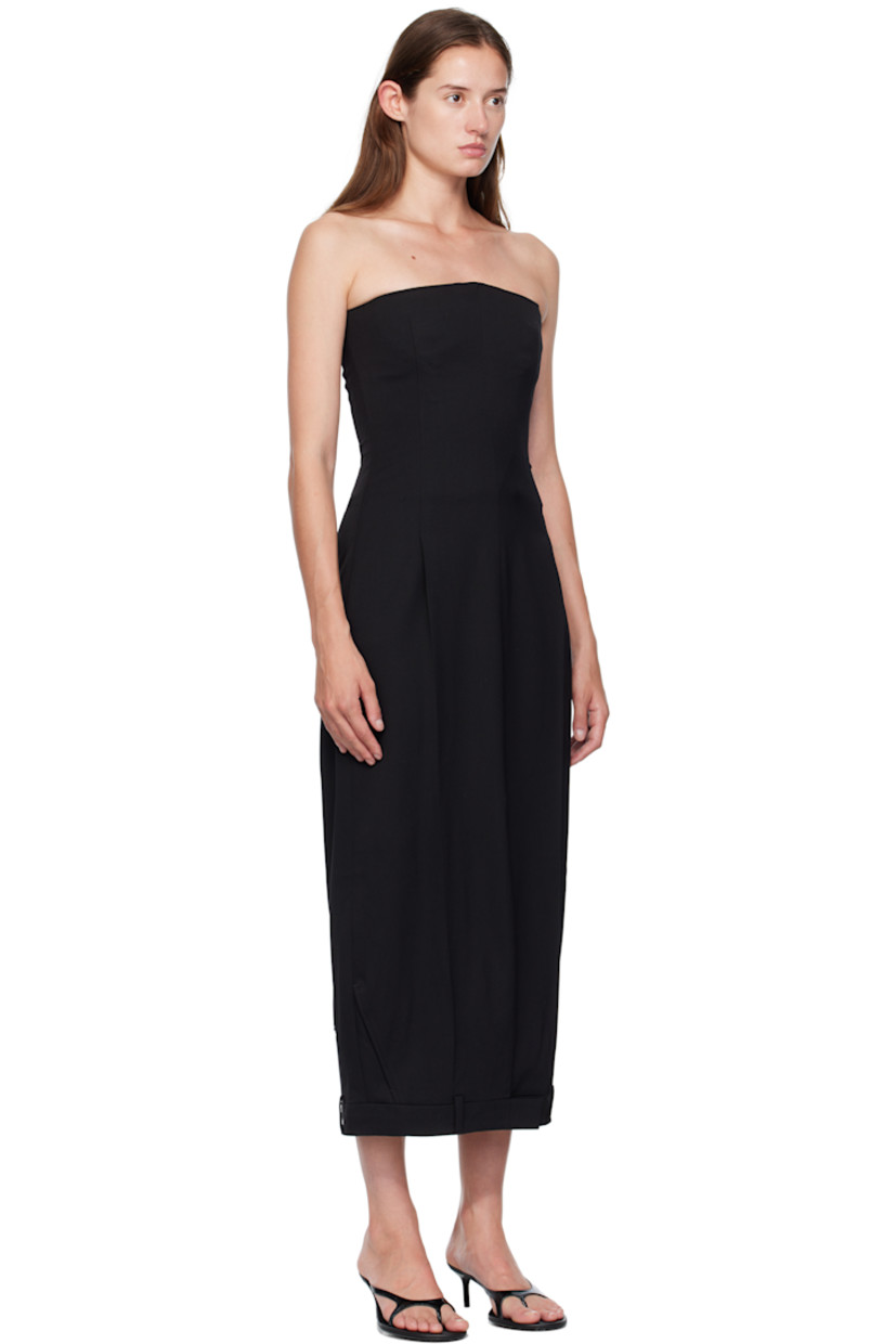 Stretch virgin wool delaine maxi dress.

· Boning throughout
· Straight neck
· Zip vent at front hem
· Belt loops at hem
· Zip closure at side seam
· Welt pockets at back
· Full satin lining

Supplier color: Black