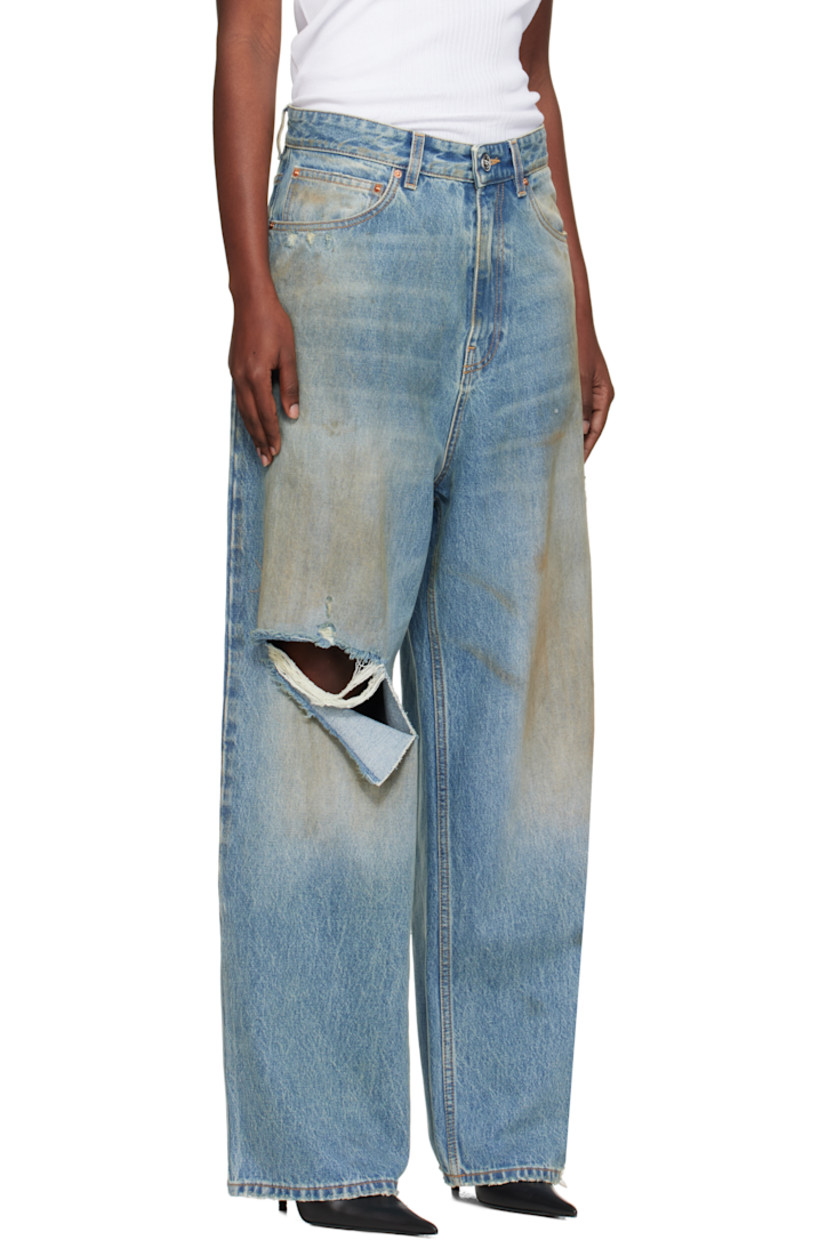 Non-stretch denim jeans.

· Fading, whiskering, and distressing throughout
· Belt loops
· Five-pocket styling
· Zip fly
· Contrast stitching in tan

Supplier color: Distressed light blue