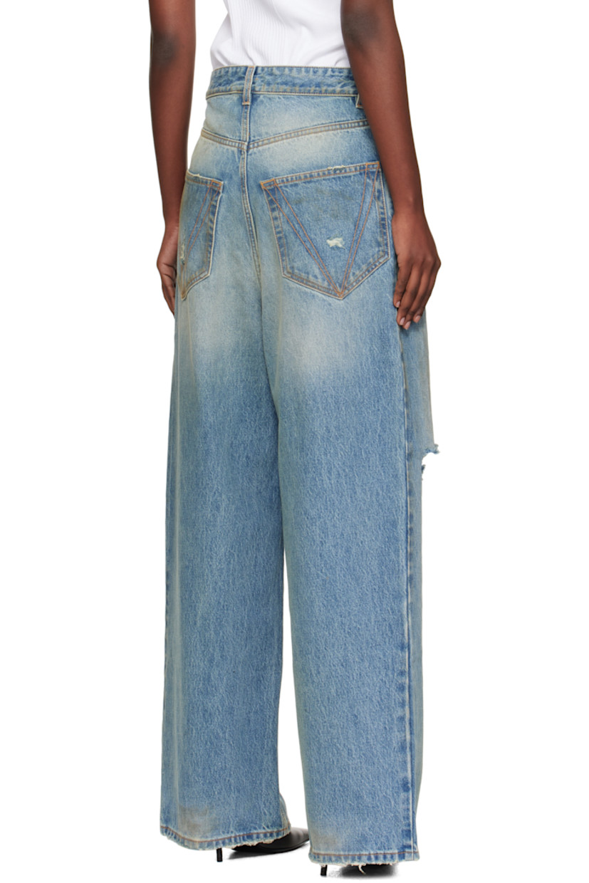 Non-stretch denim jeans.

· Fading, whiskering, and distressing throughout
· Belt loops
· Five-pocket styling
· Zip fly
· Contrast stitching in tan

Supplier color: Distressed light blue