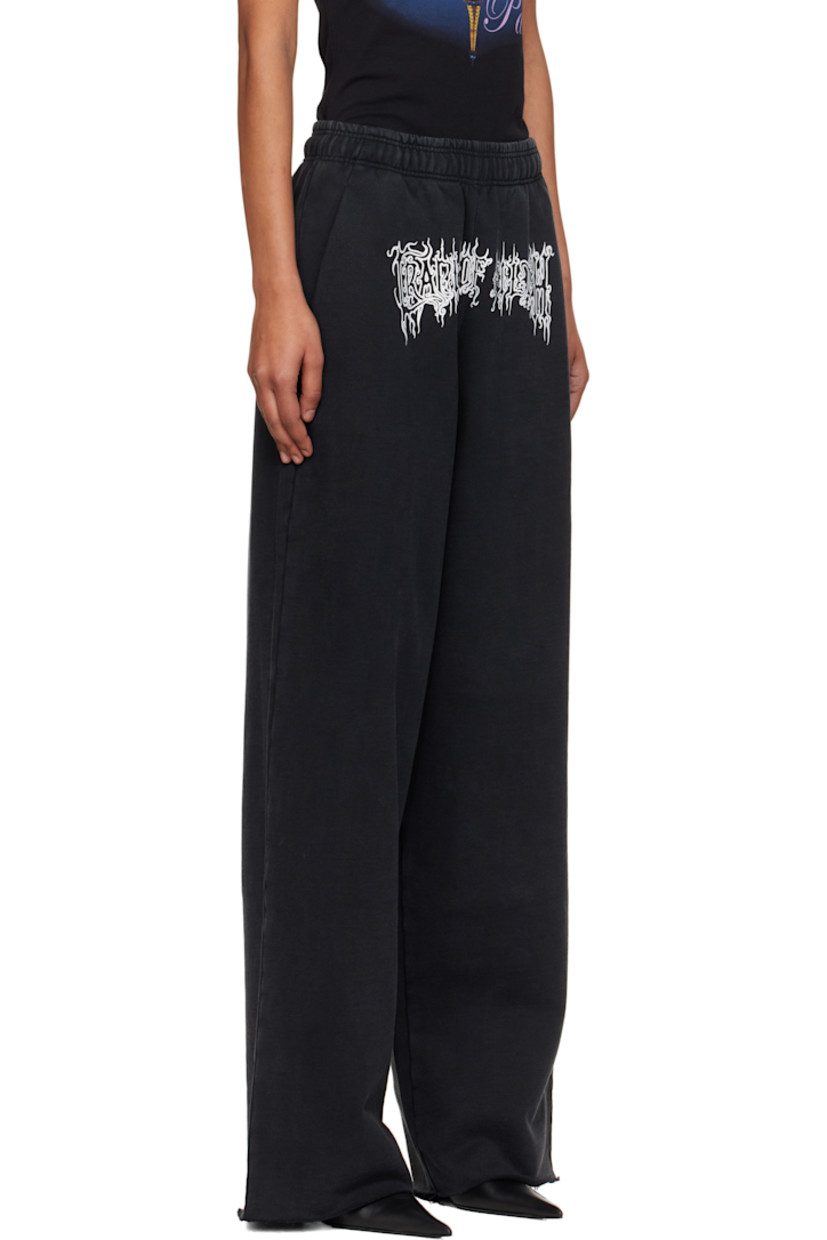 French terry lounge pants.

· Fading throughout 
· Concealed drawstring at elasticized waistband
· Three-pocket styling
· Logo printed at front
· Raw edge at cuffs 
· Logo embroidered at back pocket

Supplier color: Washed black