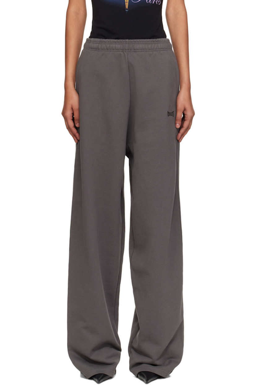 Cotton-blend French terry lounge pants.

· Fading throughout 
· Concealed drawstring at elasticized waistband
· Three-pocket styling
· Logo embroidered at front and back pocket 
· Raw edge at cuffs 

Supplier color: Magnet