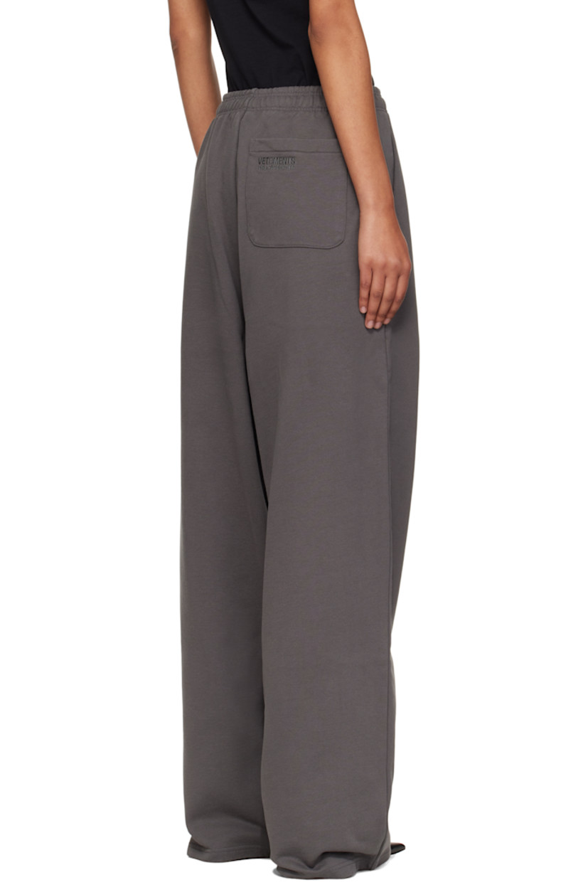 Cotton-blend French terry lounge pants.

· Fading throughout 
· Concealed drawstring at elasticized waistband
· Three-pocket styling
· Logo embroidered at front and back pocket 
· Raw edge at cuffs 

Supplier color: Magnet
