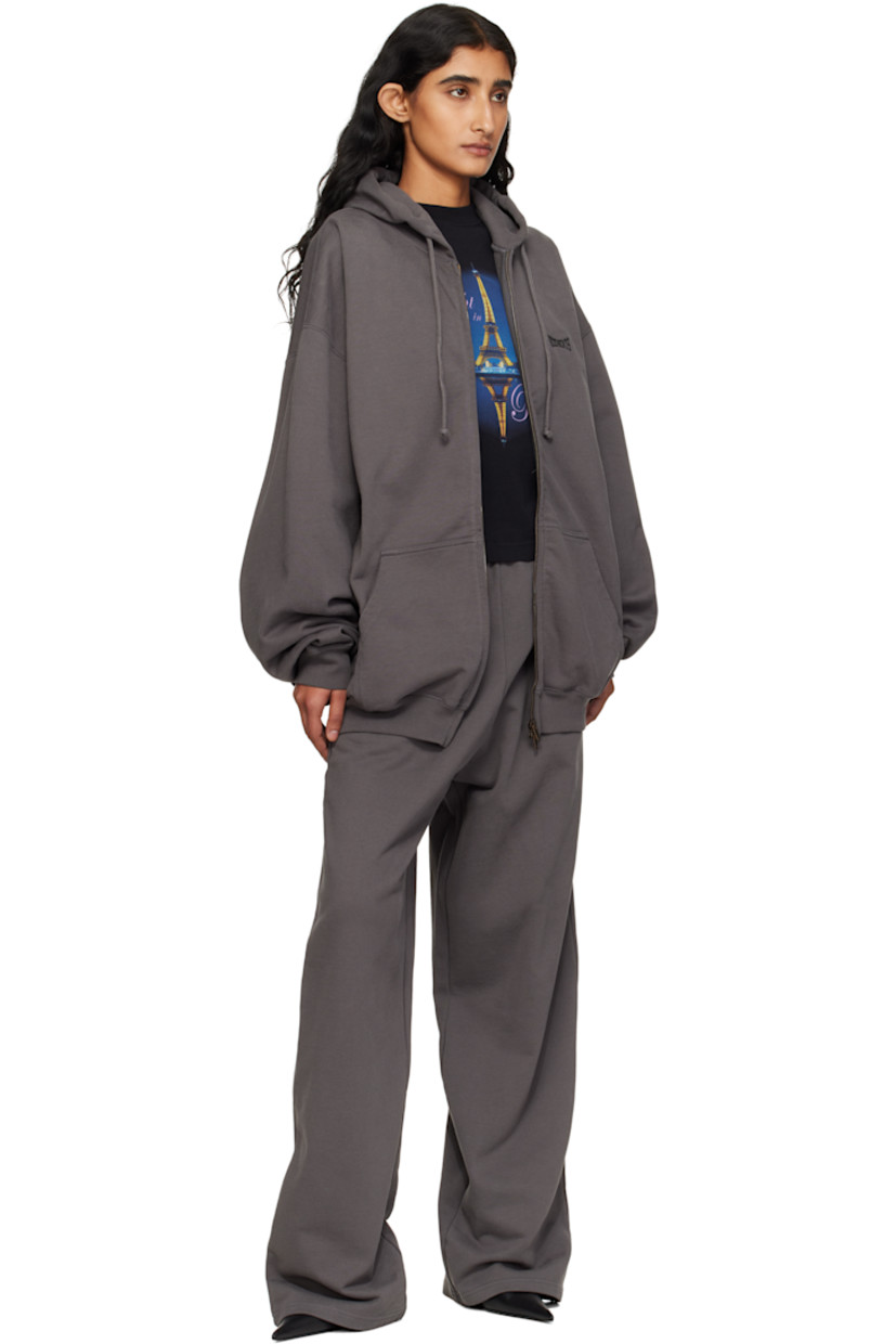 Cotton-blend French terry lounge pants.

· Fading throughout 
· Concealed drawstring at elasticized waistband
· Three-pocket styling
· Logo embroidered at front and back pocket 
· Raw edge at cuffs 

Supplier color: Magnet