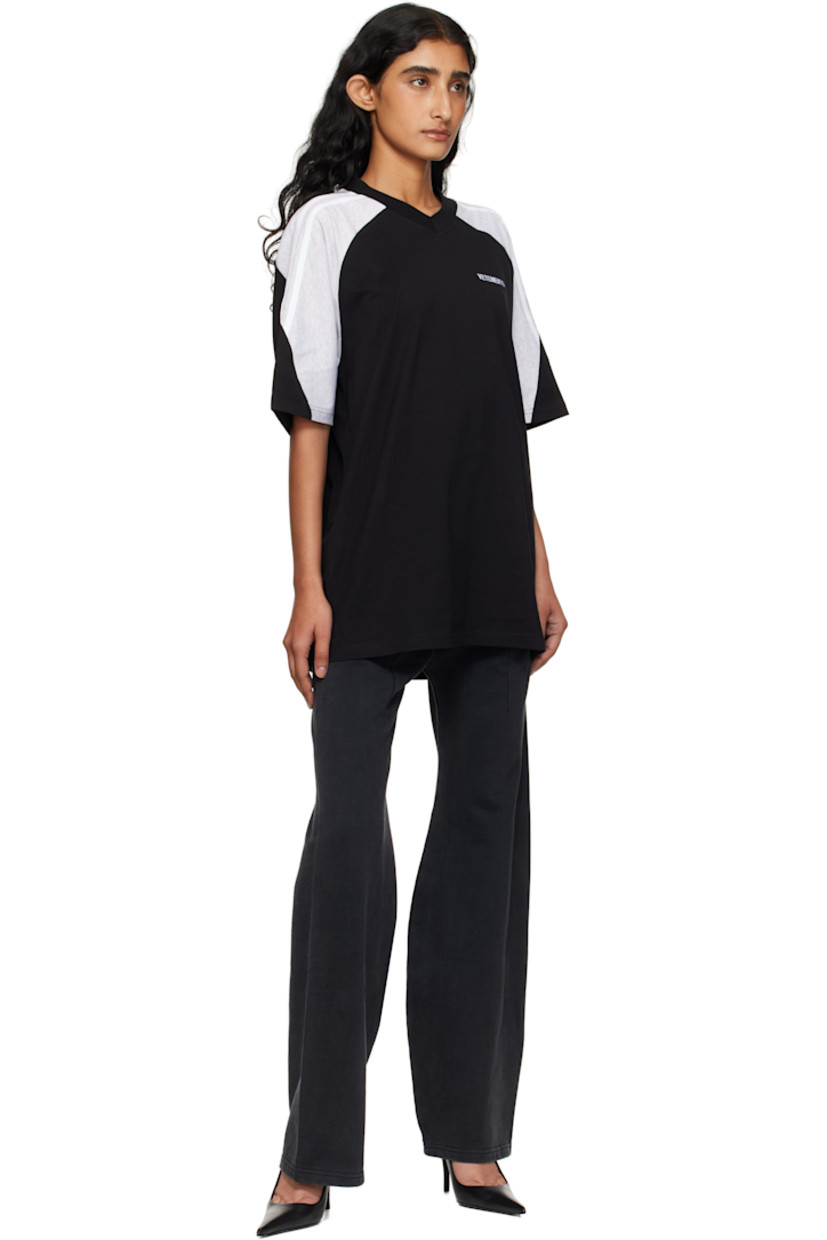Flared French terry sweatpants.

· Fading throughout
· Concealed drawstring at elasticized waistband
· Two-pocket styling
· Darts at front and back
· Text printed at front

Supplier color: Washed black
