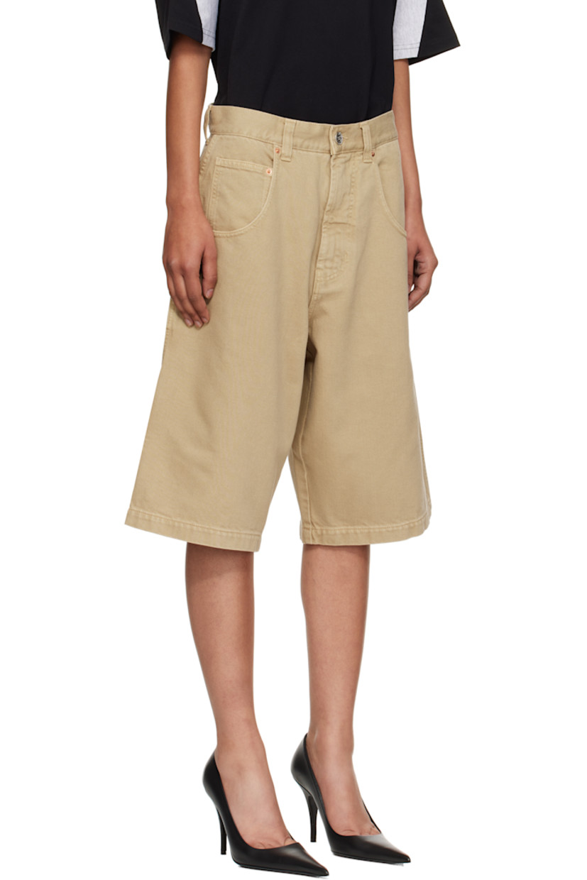 Non-stretch denim shorts.

· Belt loops
· Five-pocket styling
· Zip fly
· Hammer loop at outseam
· Patch pockets and embroidered logo at back leg
· Logo-engraved silver- and copper-tone hardware

Supplier color: Camel