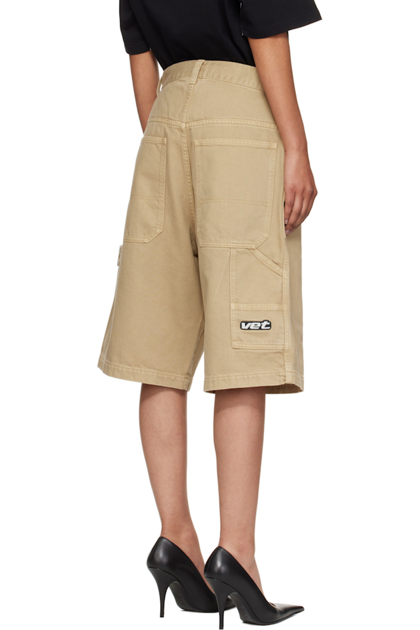 Non-stretch denim shorts.

· Belt loops
· Five-pocket styling
· Zip fly
· Hammer loop at outseam
· Patch pockets and embroidered logo at back leg
· Logo-engraved silver- and copper-tone hardware

Supplier color: Camel