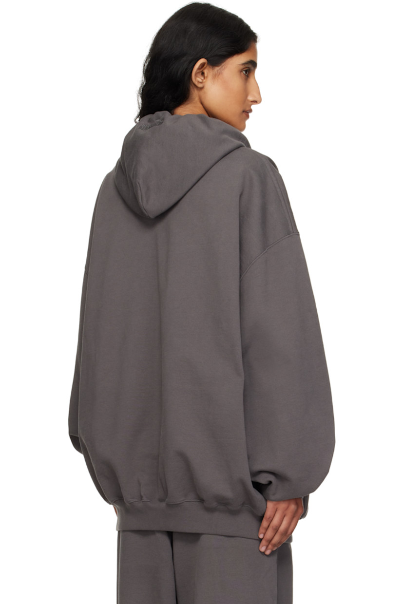 Cotton-blend French terry hoodie. 

· Drawstring and logo embroidered at hood
· Two-way zip closure
· Logo embroidered at chest
· Patch pockets
· Rib-knit hem and cuffs
· Dropped shoulders

Supplier color: Magnet