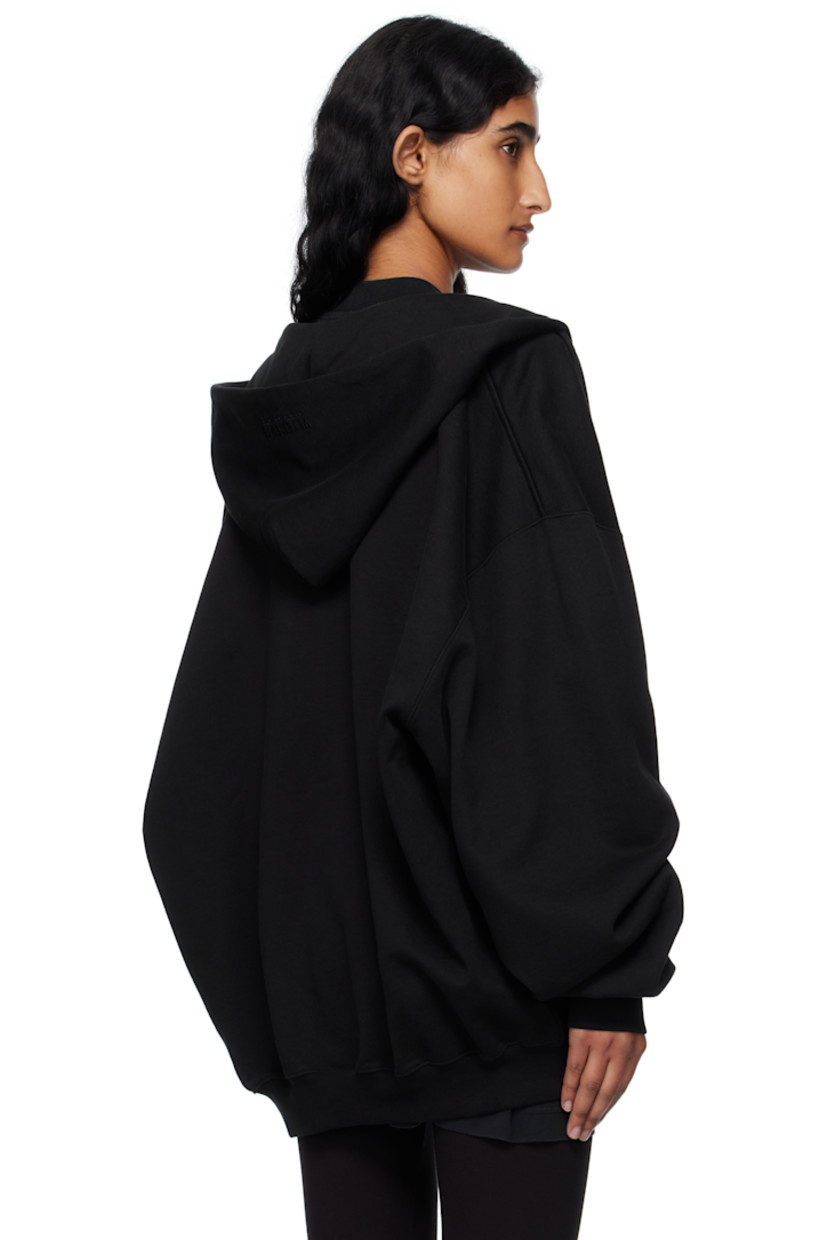 French terry hoodie.

· Drawstring at hood
· Logo embroidered at hood and back collar
· Two-way zip closure
· Patch pockets at front
· Rib-knit hem and cuffs
· Dropped shoulders

Supplier color: Black