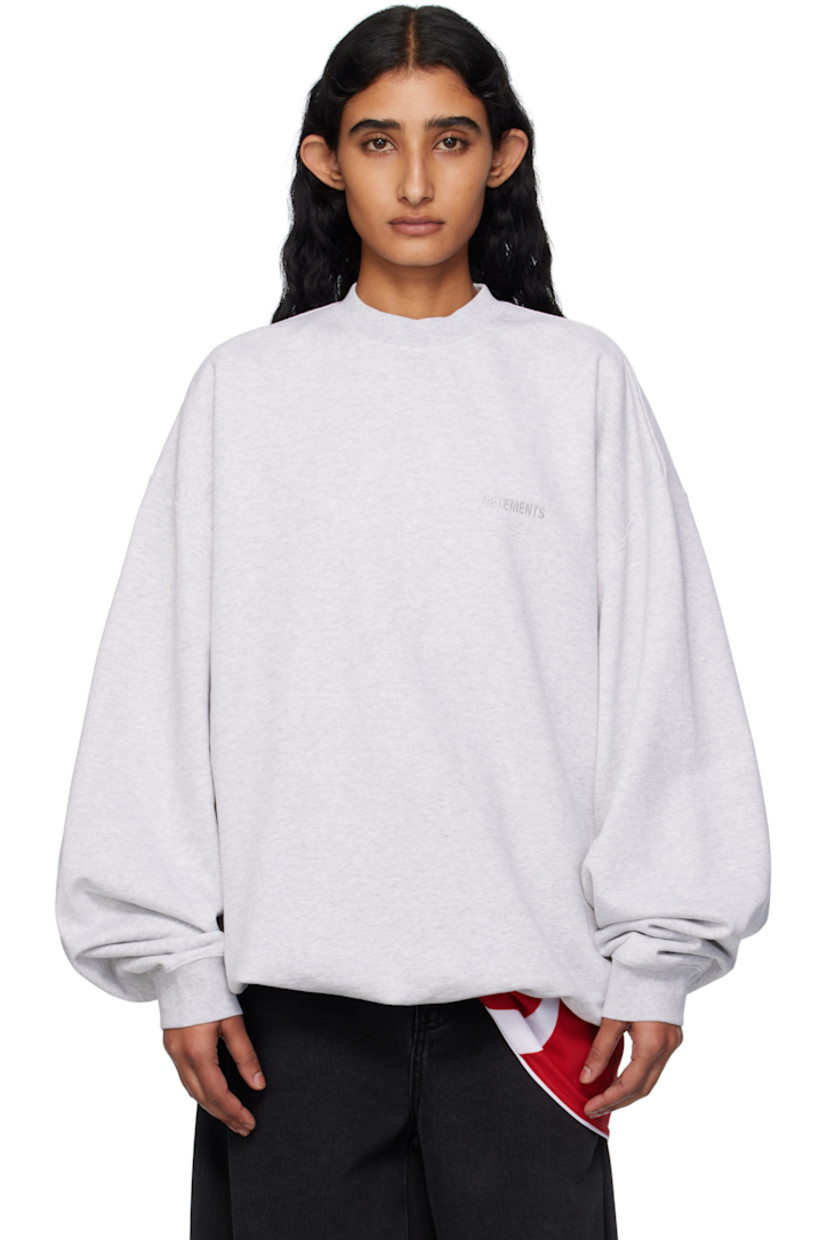 French terry sweatshirt.

· Rib-knit crewneck, hem, and cuffs
· Logo embroidered at chest and back collar
· Dropped shoulders

Supplier color: Grey melange